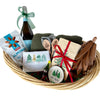 Gift basket with a bottle of wine, snacks, and other items on a white background